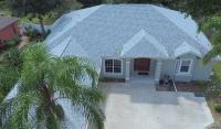 Home with a light gray shingle roof