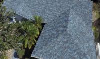 Home with a dark gray shingle roof